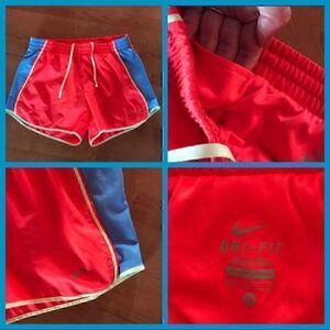 NWOT. NIKE DRI FIT DARK ORANGE and BLUE SHORTS.